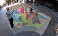 travel.com.au's  3D artwork with two members of the public at Martin Place