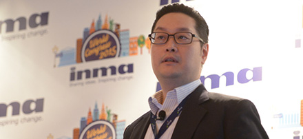 Michael Chu speaking at the INMA World Congress 2015 