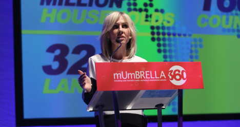Taylor speaking at Mumbrella360