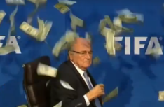 FIFA president Sepp Blatter was showered in money by a British comedian at a press conference