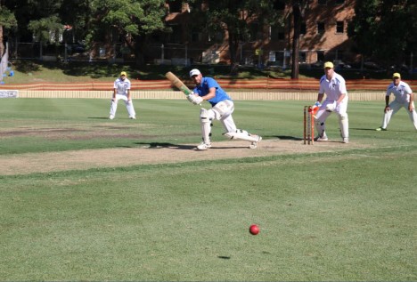 Initiative's Rob Aoukar hits one off the square 