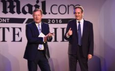 Piers Morgan and Martin Clarke speaking at the Daily Mail presentations in New York