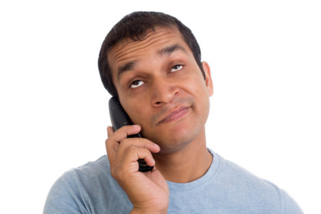 Indian Man Annoyed and bored at Phone on Hold again…!