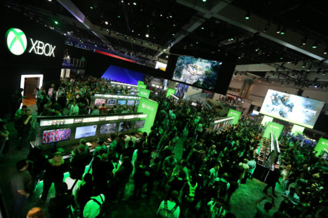 E3 2016 attendees interact with newly announced games and experiences at the Xbox booth at E3 2016 in Los Angeles on Tuesday, June 14, 2016. (Photo by Casey Rodgers/Invision for Microsoft/AP Images)
