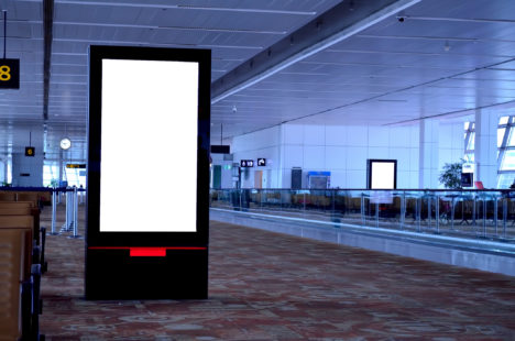 LCD TV with empty copy space at airport shot in Delhi, India.