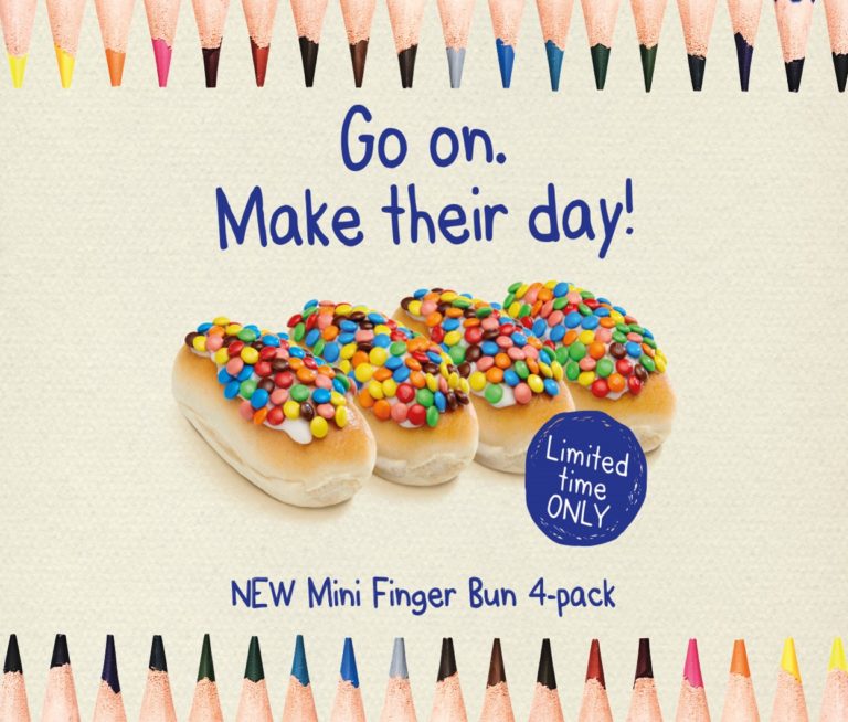 Bakers Delight ad promoting bread rolls topped with M&Ms as kids' lunch